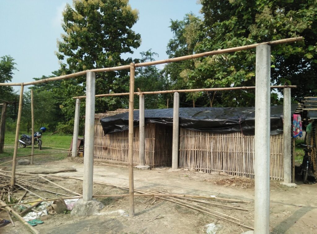 This photo shows one of the homes in the village in need of a new roof.